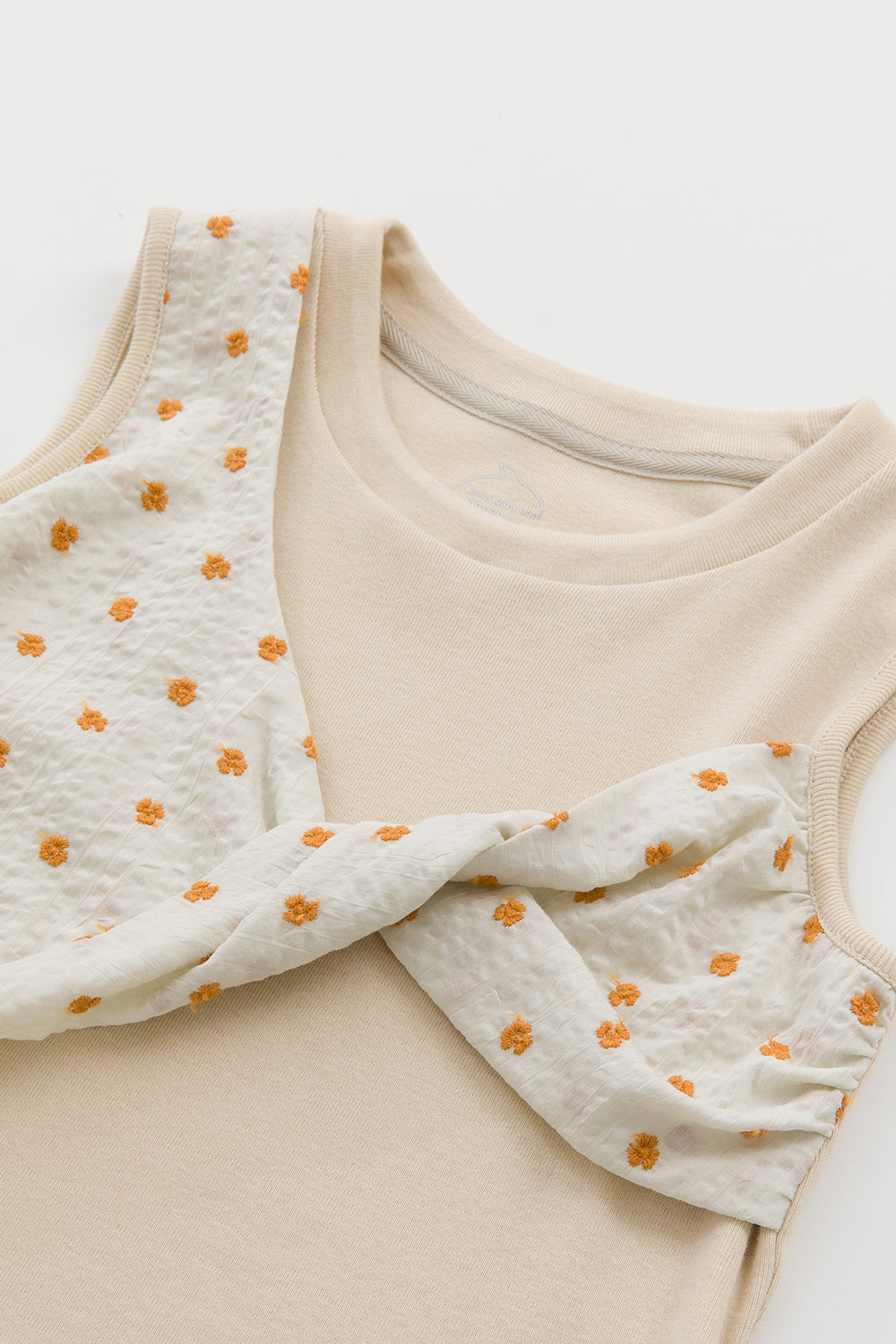 【予約商品】Luxury コレクション:Mini Fleur ツイストノースリーブトップス