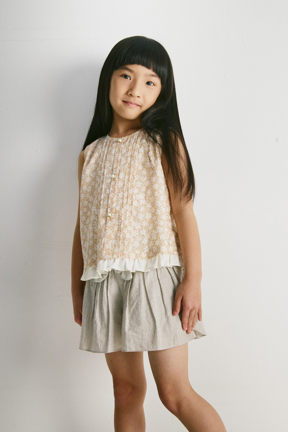 【予約商品】Luxury コレクション：Bloom ピンタックフロントノースリーブトップス