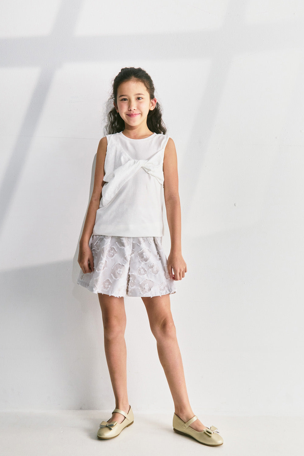 【予約商品】Luxury コレクション：Mini Fleur ツイストノースリーブトップス