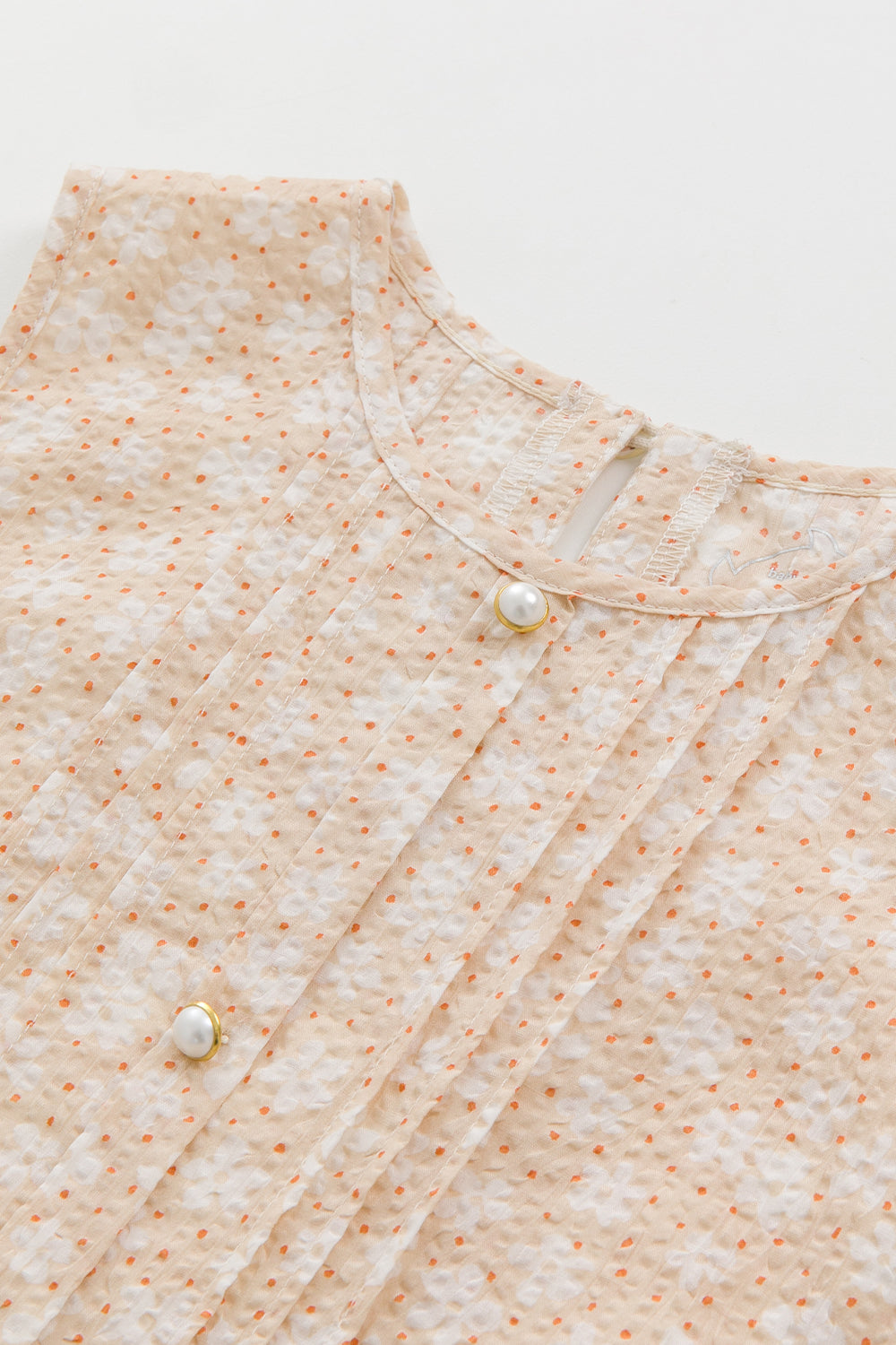 【予約商品】Luxury コレクション：Bloom ピンタックフロントノースリーブトップス