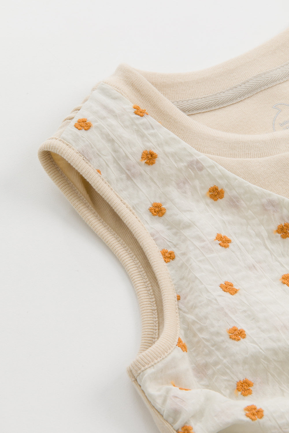 【予約商品】Luxury コレクション：Mini Fleur ツイストノースリーブトップス
