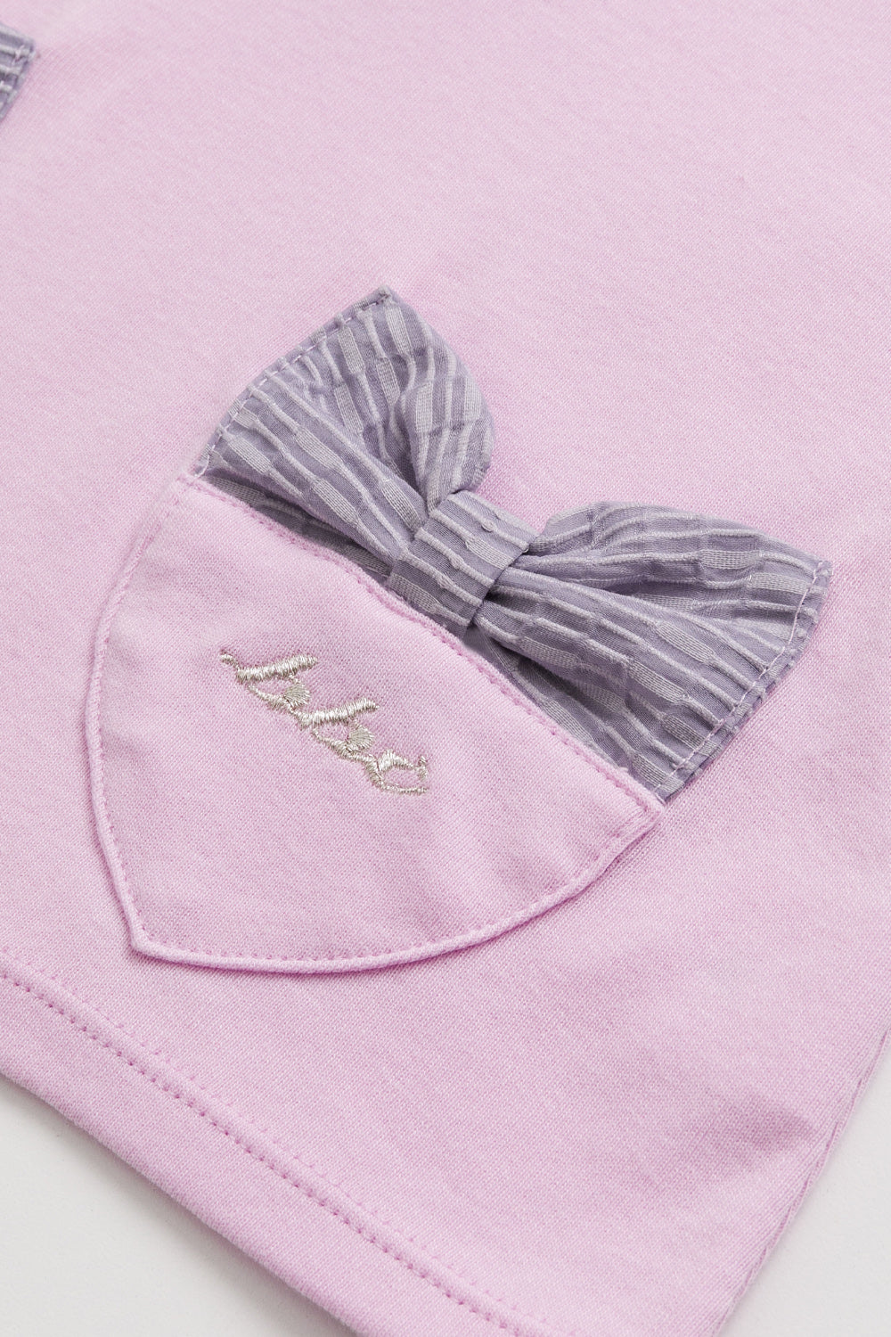 【予約商品】Mainコレクション：Love Note フリルカラー ハートポケット リボン オーガニックコットン長袖トップス